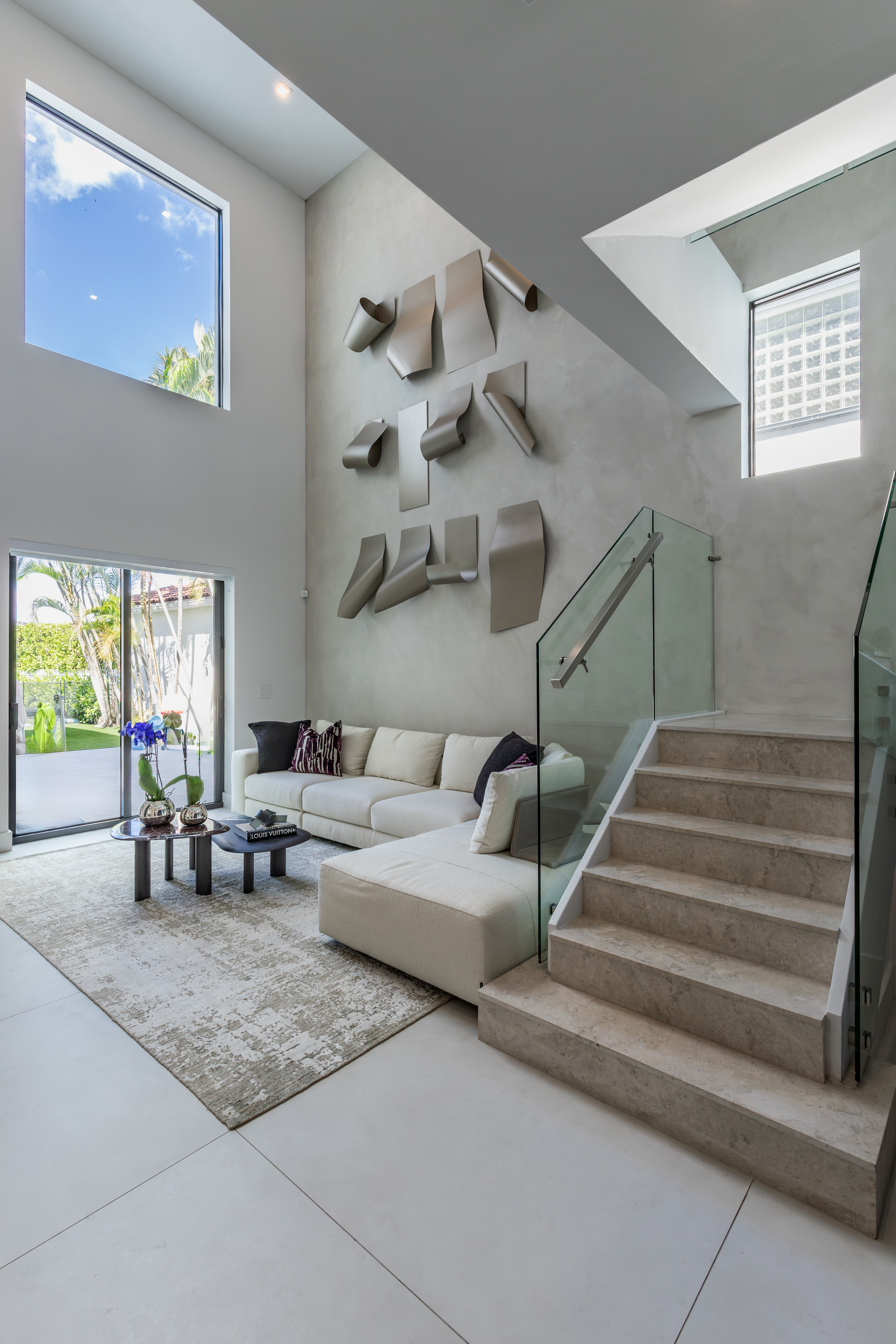 Living room and glass staircase