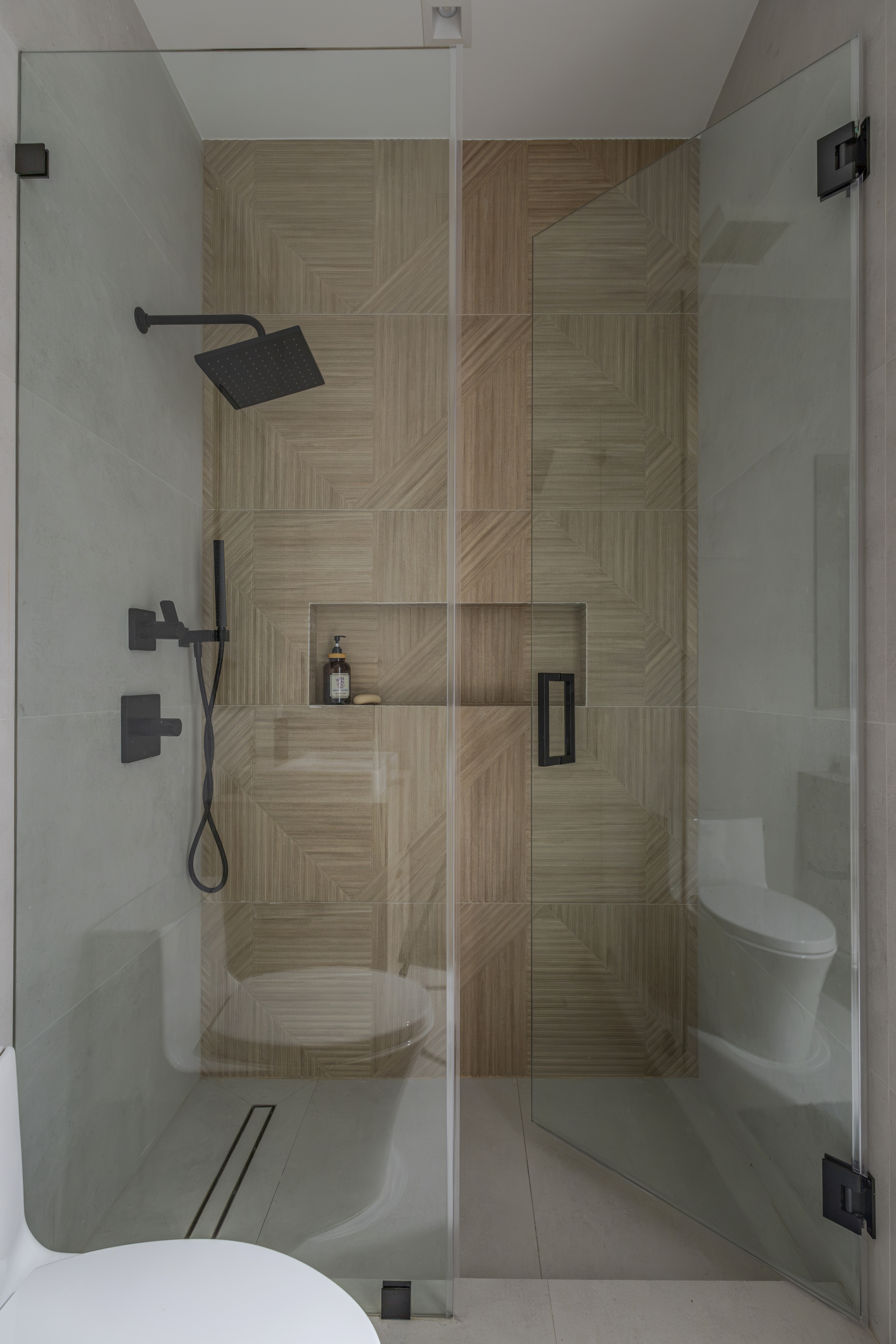 Bathroom — frameless glass shower with decorative tile