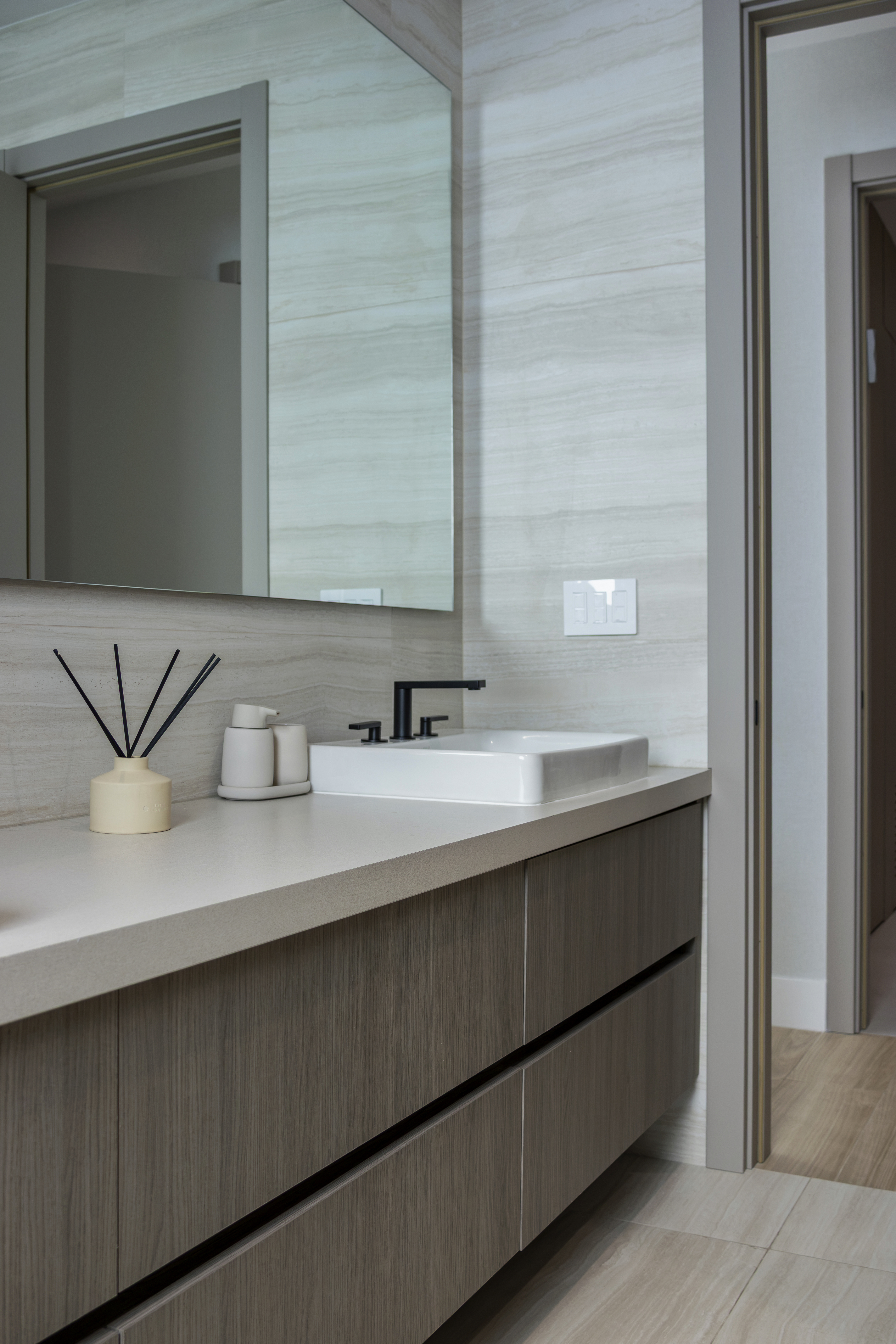 Master bathroom — vanity with single sink and large mirror