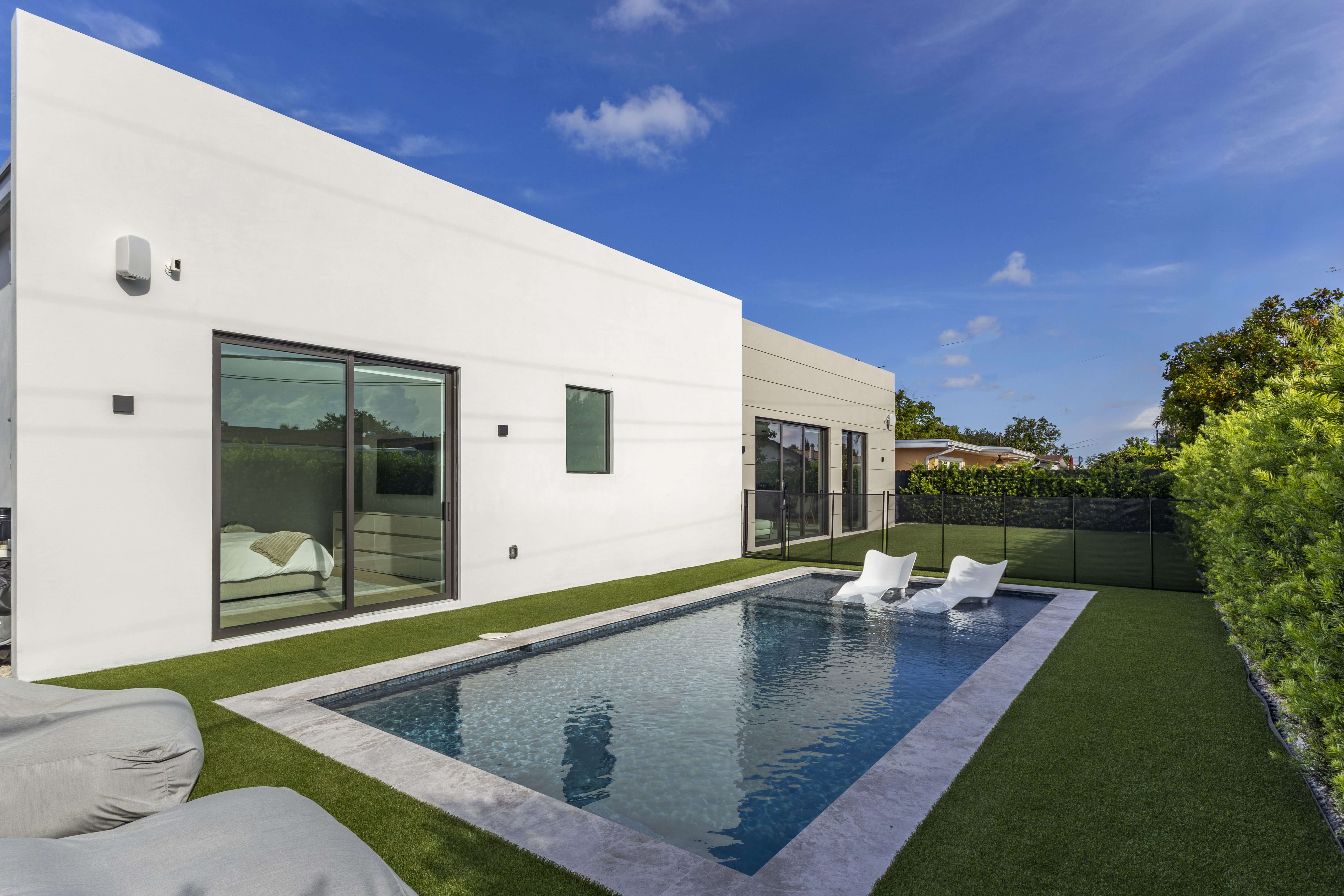 Exterior — pool and rear facade