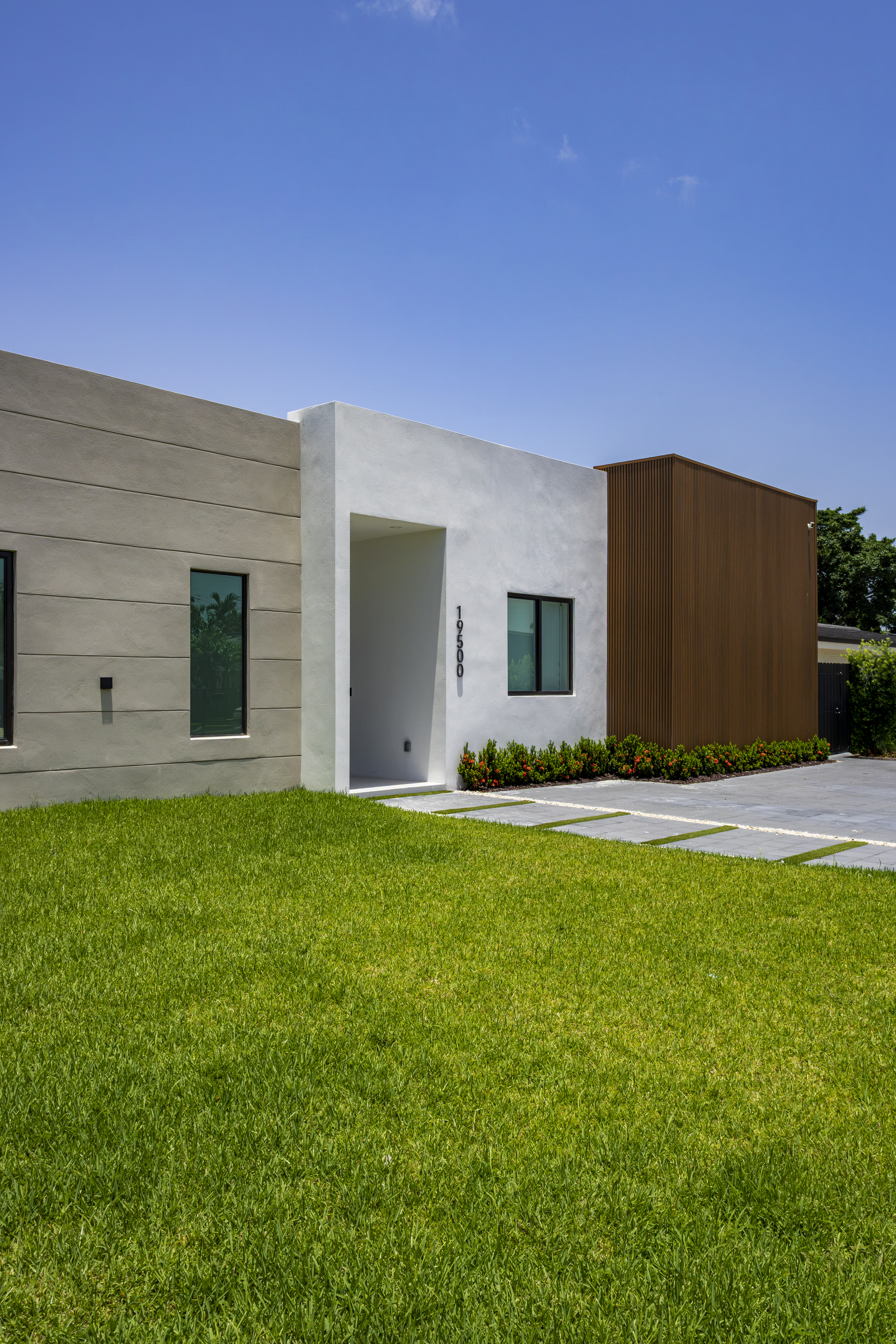Exterior — front facade with green lawn