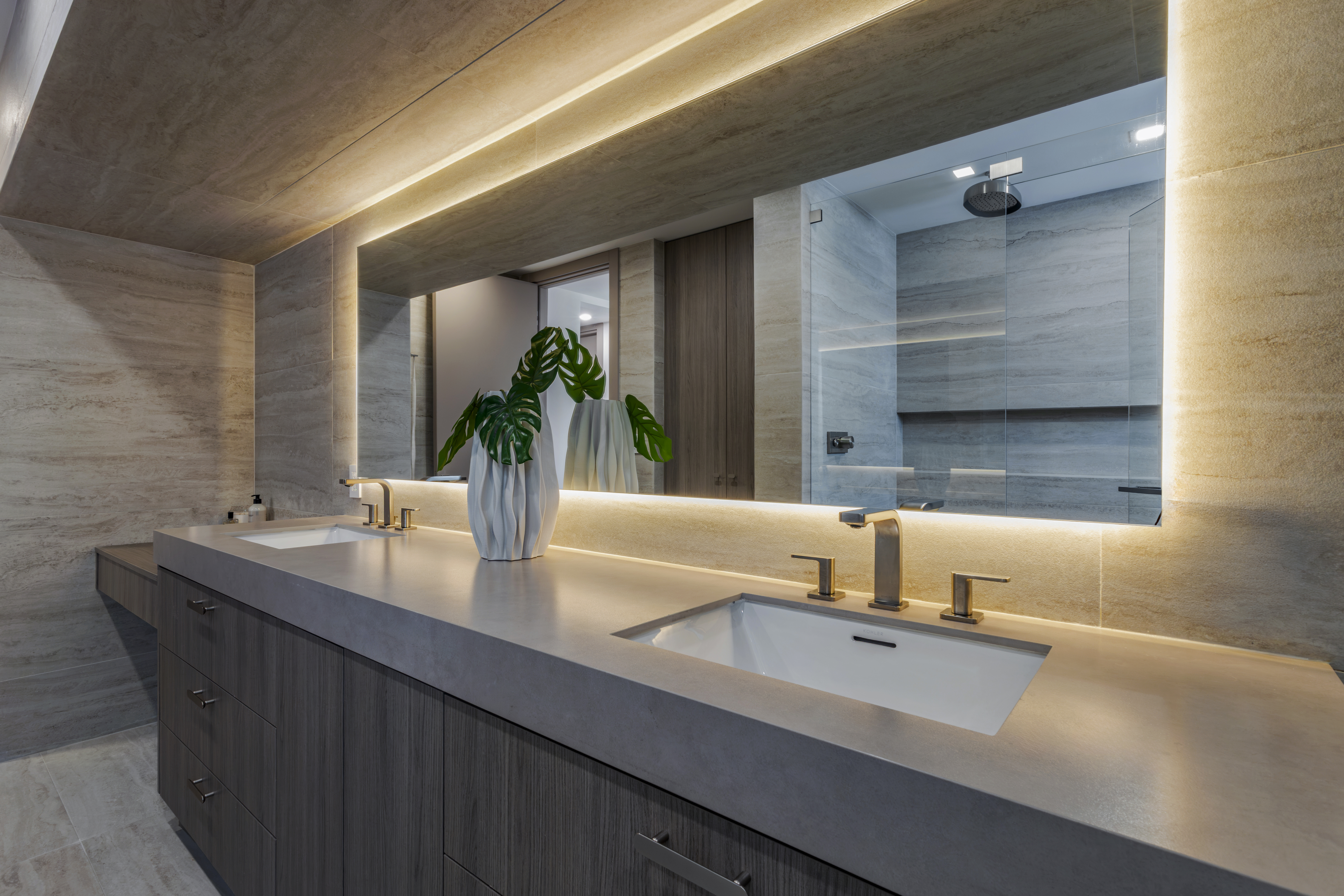 Master bath — wide vanity with gold faucets