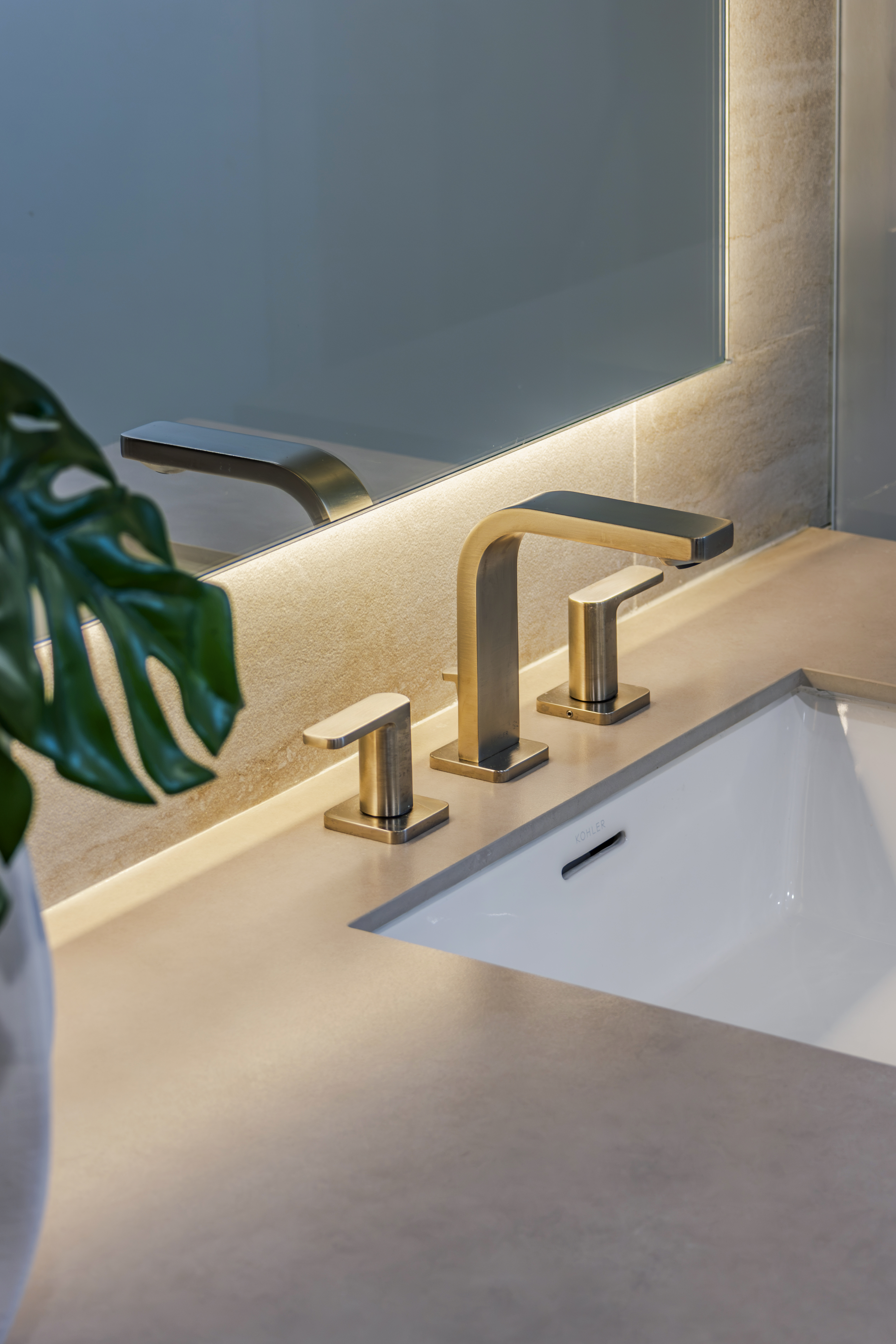 Master bath — brushed gold faucet detail