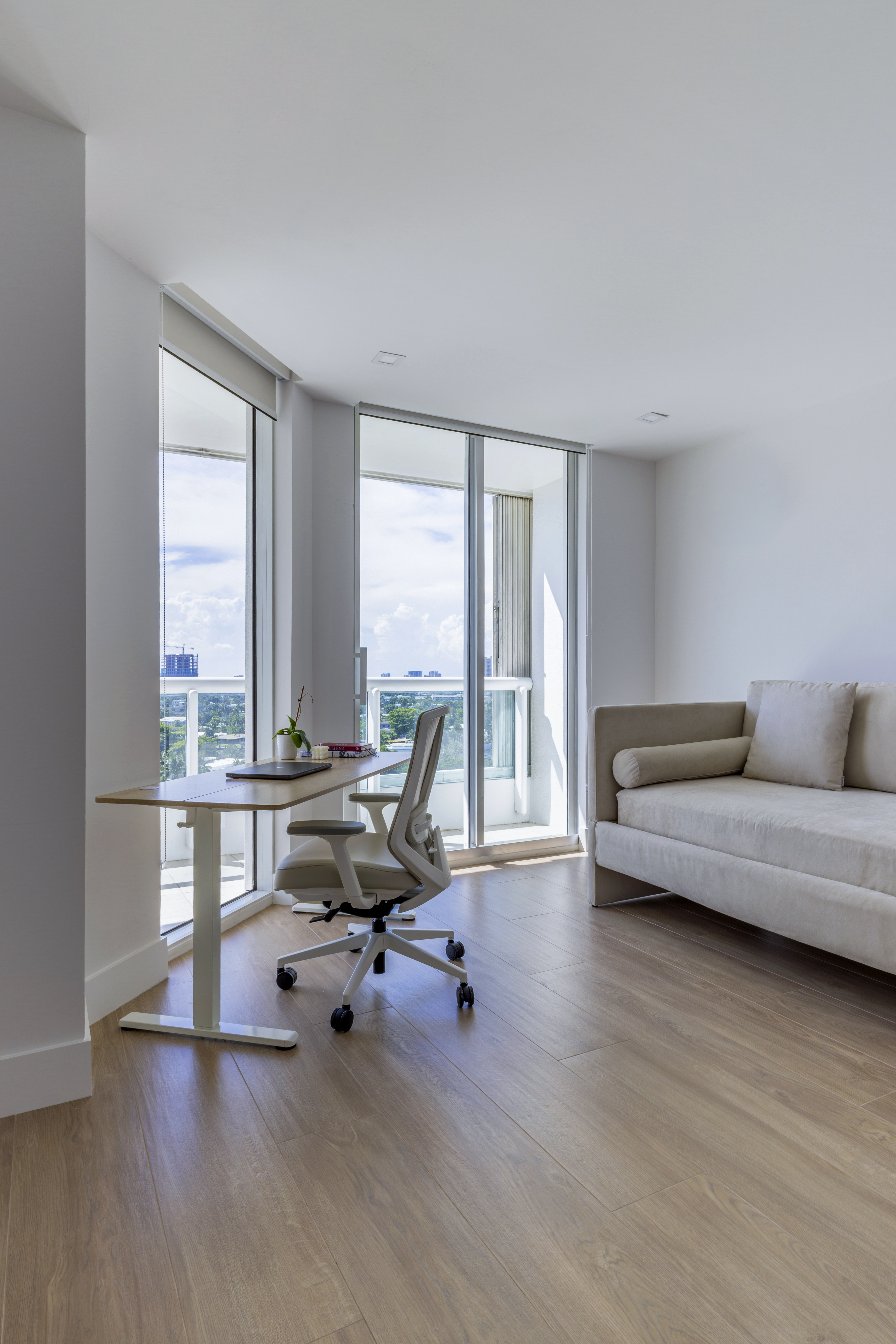 Home office — standing desk with panoramic city view
