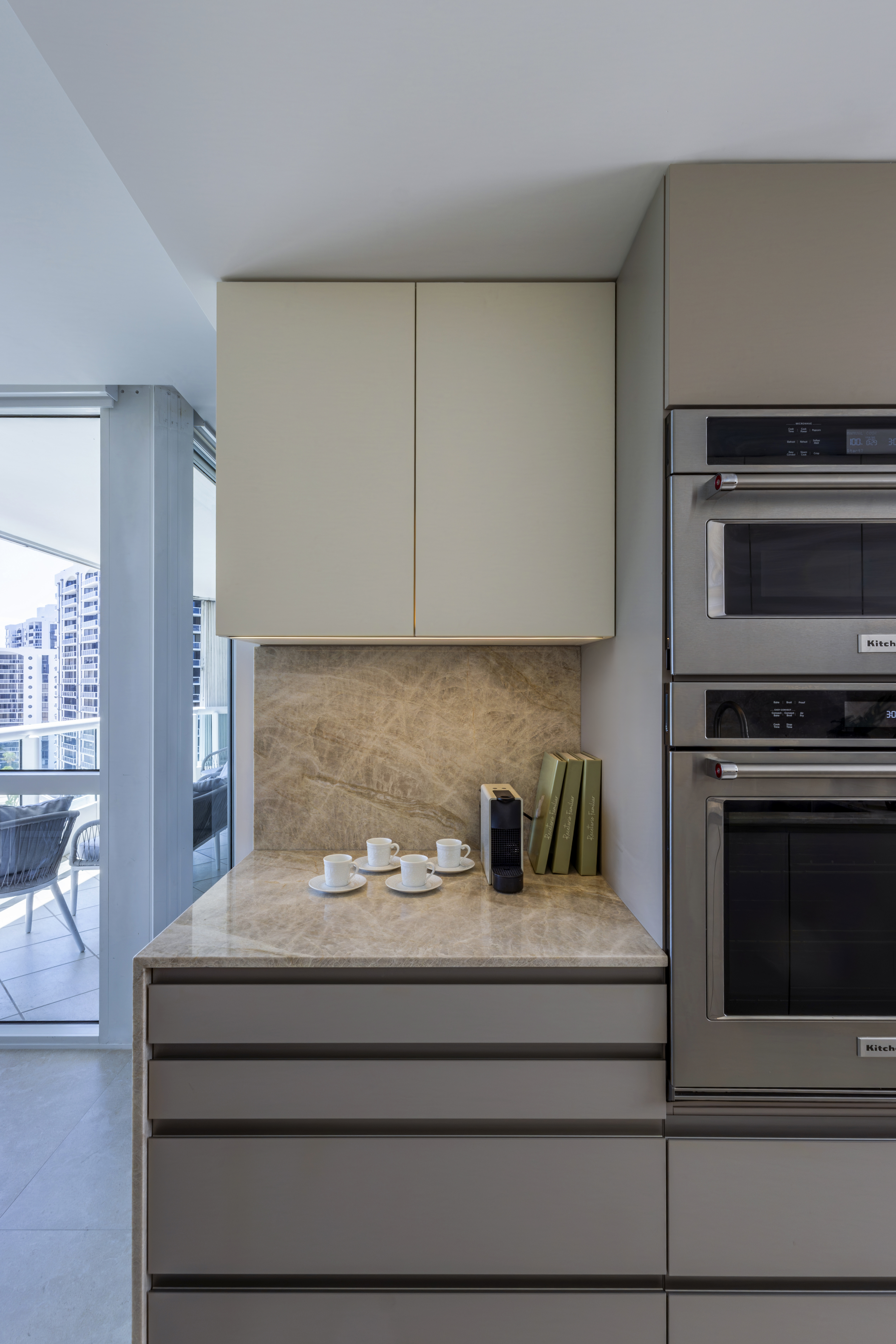 Oven and microwave tower with espresso counter nook